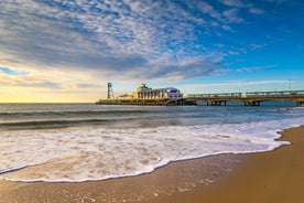 Photo of aerial view of the famous Blackpool Tower and beach on a beautiful Summer day on one of Great Britains most popular holiday destinations, England.