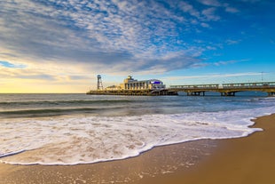 Photo of aerial view of the famous Blackpool Tower and beach on a beautiful Summer day on one of Great Britains most popular holiday destinations, England.