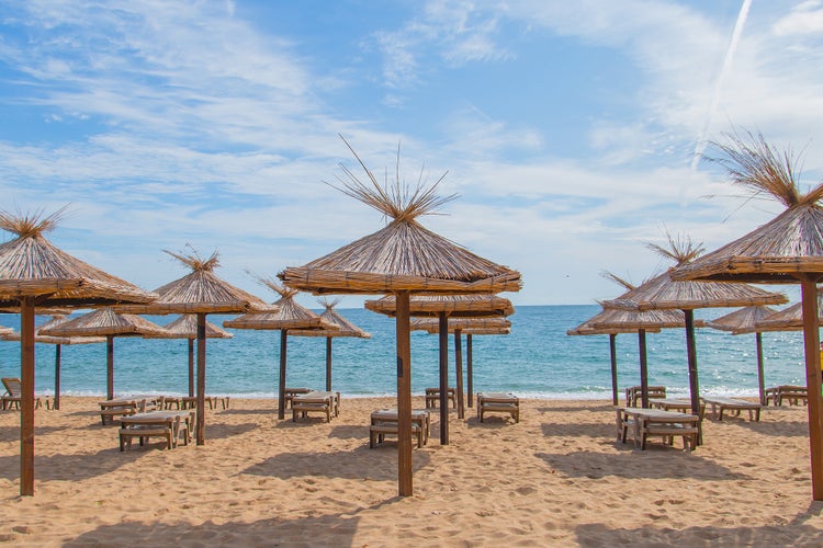 Photo of umbrellas in sunny Golden Sands in Varna, Bulgaria.