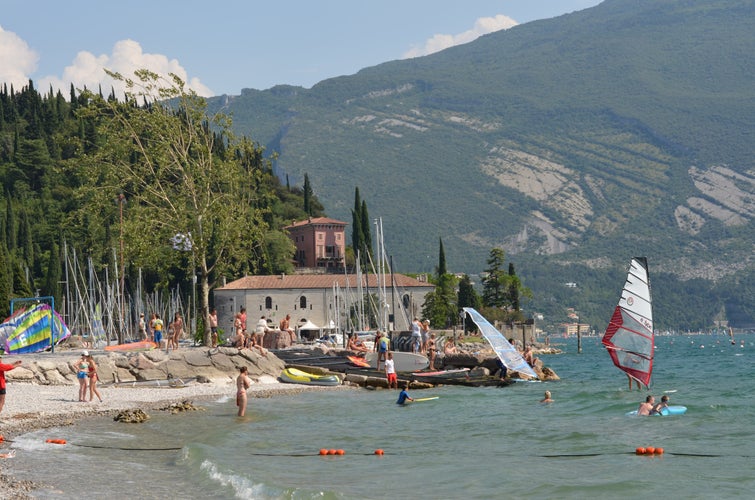 Riva Del Garda Trento  People who bath and sun bathe in the lake