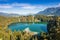 photo of a top view of Freibergsee in a summer day with blue sky at Oberstdorf, Germany.