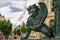 Photo of 19th century Roman-style marble Fountain of the Lions or Fonte dos Leoes featuring 4 winged lions on Praca de Gomes Teixeira square in Porto, Portugal.