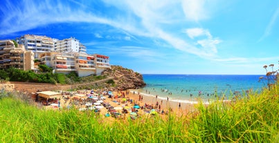 Photo of aerial view of beach and cityscape Salou, Spain.