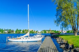 Early autumn morning panorama of the Port of Turku, Finland, with Turku Castle at background.