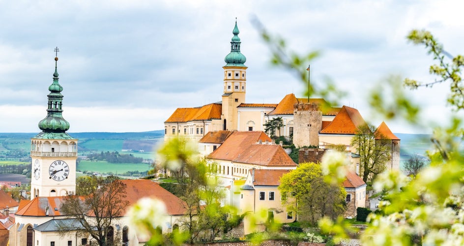 Mikulov Castle overlooking red rooftops and vineyards, a scenic wine destination in Czechia in July..jpg