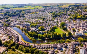 Aerial drone view of Manchester city in UK on a beautiful sunny day.