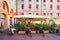 Piazza del Municipio with tables of restaurant in Ferrara, Emilia-Romagna, Italy. Ferrara is capital of the Province of Ferrara.