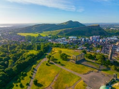 Photo of beautiful view of the old town city of Edinburgh from Calton Hill, United Kingdom.