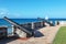 photo of view ofVintage canons line the ramparts at the Charles Fort in Bridgetown Barbados, Kinsale, Irland.