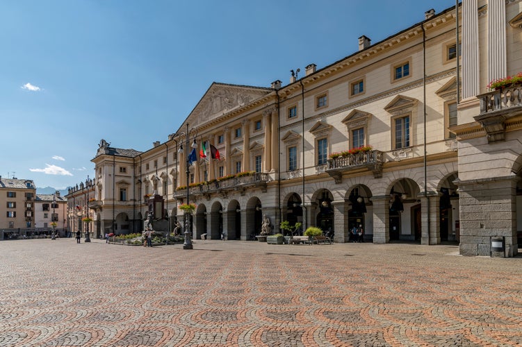 A glimpse of the beautiful square Émile Chanoux and the Hotel de Ville, in the historic center of Aosta, Italy