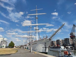 Early autumn morning panorama of the Port of Turku, Finland, with Turku Castle at background.