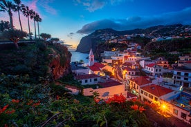 Photo of panoramic aerial view of idyllic coastal village of Porto da Cruz Madeira island, Portugal.