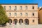 photo of view of Syntagma square, the historical square of Nafplio surrouned by old beautiful neoclassical buildings around the famous square, Greece.