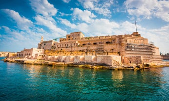 Aerial view of Lady of Mount Carmel church, St.Paul's Cathedral in Valletta embankment city center, Malta.