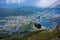 The view of Bergen, Norway, from Ulriken, the highest point of the Seven Mountains that surround the city, after a morning fog has lifted. The Ulriken Cable Car brings tourists to the peak.