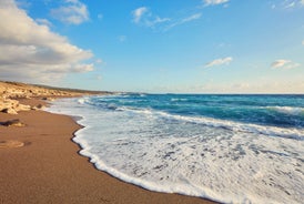 Photo of panoramic aerial view of Kalamis beach and bay in the city of Protaras, Cyprus.