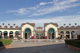 Excursão privada de compras de Gênova ao Serravalle Designer Outlet