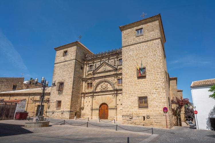 Sunny facade and the gate of Casa de las Torres or Palace of Davalos (nowadays School of Art) in Ubeda, Andalusia, Spain