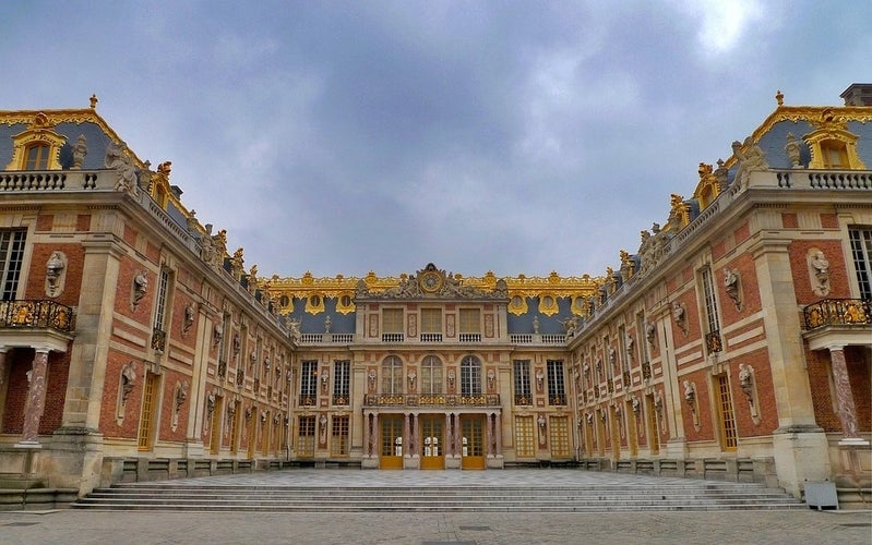 photo of view of the entrance of the place, Versailles, France.