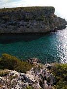 Photo of aerial view of Cala Agulla and beautiful coast at Cala Ratjada, Mallorca, Spain.