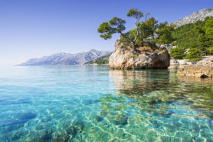 Photo of aerial view of gorgeous azure scene of summer Croatian landscape in Podgora, Dalmatia, Croatia.