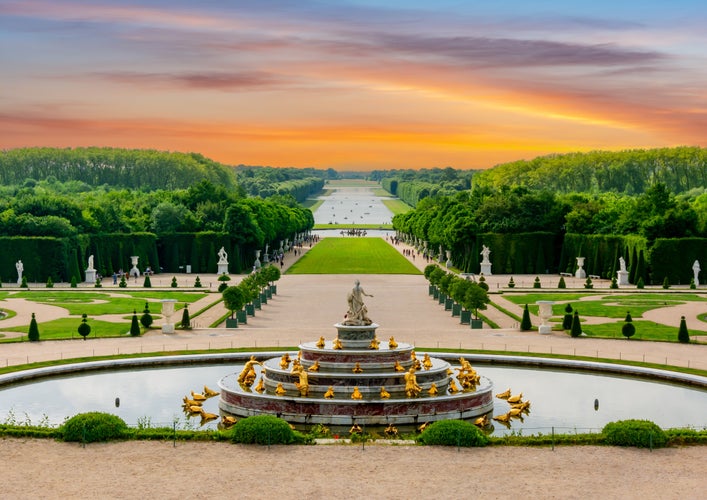 Latona fountain and Versailles park landscape at sunset, Paris suburbs, France.jpg