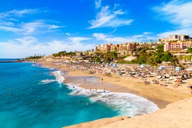 Photo of aerial view with Puerto de la Cruz, in background Teide volcano, Tenerife island, Spain.