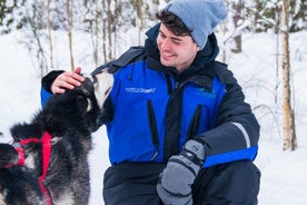 Safari di mezza giornata con husky e pesca sul ghiaccio al salmone