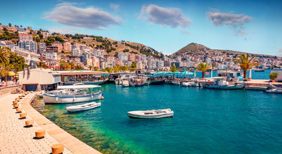 Perfect spring cityscape of Saranda port. Picturesque Ioninian seascape. Bright morning scene of Albania, Europe. Traveling concept background.