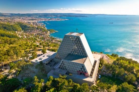 Photo of Trieste lighthouse Phare de la Victoire and cityscape panoramic aerial view, Friuli Venezia Giulia region of Italy.