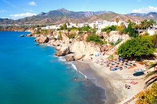 Photo of aerial view of beach in Nerja, Malaga province, Costa del Sol, Andalusia, Spain.