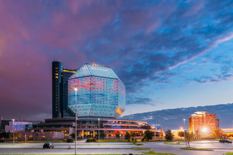 Photo of Minsk, Belarus. National Library Building In Summer Evening Sunset Time. Famous Landmark.