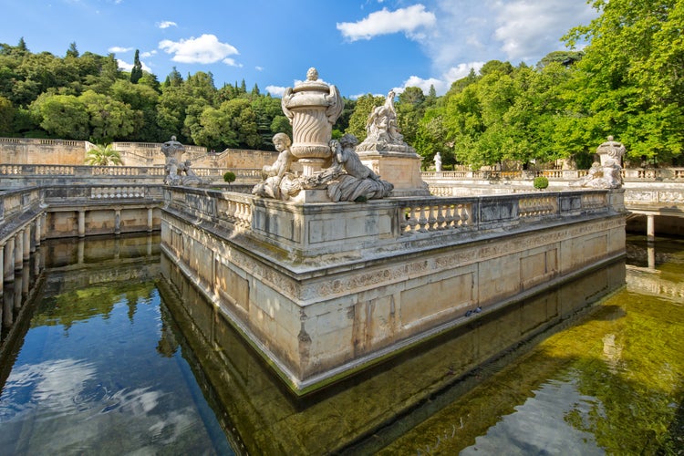 Photo of Le Nymphée with sculpture group at the park Les Jardin de la Fontaine in Nimes.