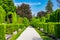 Photo of green alley in baroque cemetery in Varazdin city, Croatia.