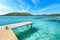 Photo of amazing landscape with wooden pier on Santa Giulia beach, Porto-Vecchio ,France.