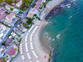 Photo of Umbrellas and sunbeds in San Felice Circeo, Italy.