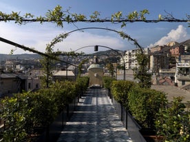 Photo of beautiful landscape of panoramic aerial view port of Genoa in a summer day, Italy.