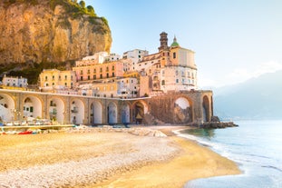 Photo of aerial morning view of Amalfi cityscape on coast line of Mediterranean sea, Italy.