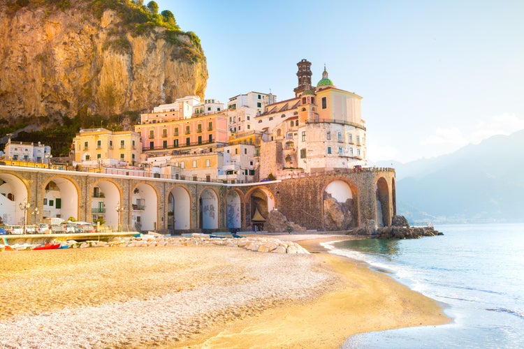 Photo of morning view of Amalfi cityscape on coast line of Mediterranean sea, Italy.