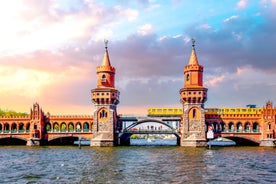 Photo of scenic summer view of the German traditional medieval half-timbered Old Town architecture and bridge over Pegnitz river in Nuremberg, Germany.