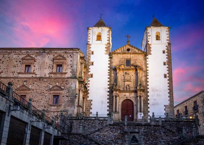 Plaza de San Jorge with the monumental Church of San Francisco in the historic center declared a UNESCO World Heritage Site in Cáceres, Spain at sunset