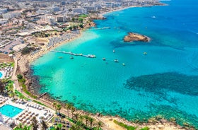 Photo of panoramic aerial view of Kalamis beach and bay in the city of Protaras, Cyprus.