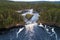 An aerial view of Kiutaköngäs rapids in the northern taiga forest of Finland.