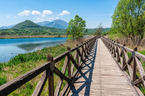 photo of Idyllic view at Posta Fibreno Lake Natural Reserve. In the province of Frosinone, Lazio, Italy.