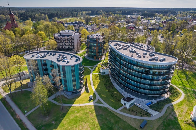 Aerial view of Druskininkai city in Lithuania during summer day, which is a popular tourist destination due to variety of Spa and health facilities and famours for it's natural mineral water