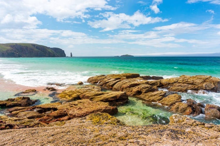 Sandwood Bay Beach, a stunning NC500 attraction in North West Scotland, on a sunny summer day,.jpg