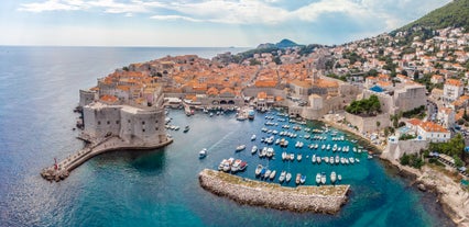 Photo of panoramic aerial view of the old town of Dubrovnik, Croatia seen from Bosanka viewpoint on the shores of the Adriatic Sea in the Mediterranean Sea.