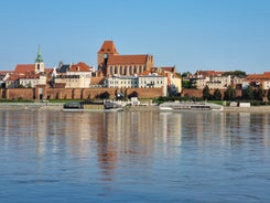 Photo of aerial view of Torun old town with Vistula river, Poland.