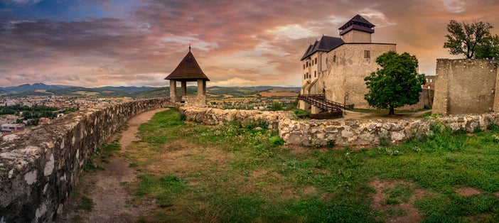 The inner Gothic castle in Trencin Slovakia with Renaissance palace and castle gate dramatic stormy sky