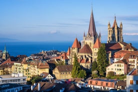 View of the Old Town of Basel with red stone Munster cathedral and the Rhine river, Switzerland.